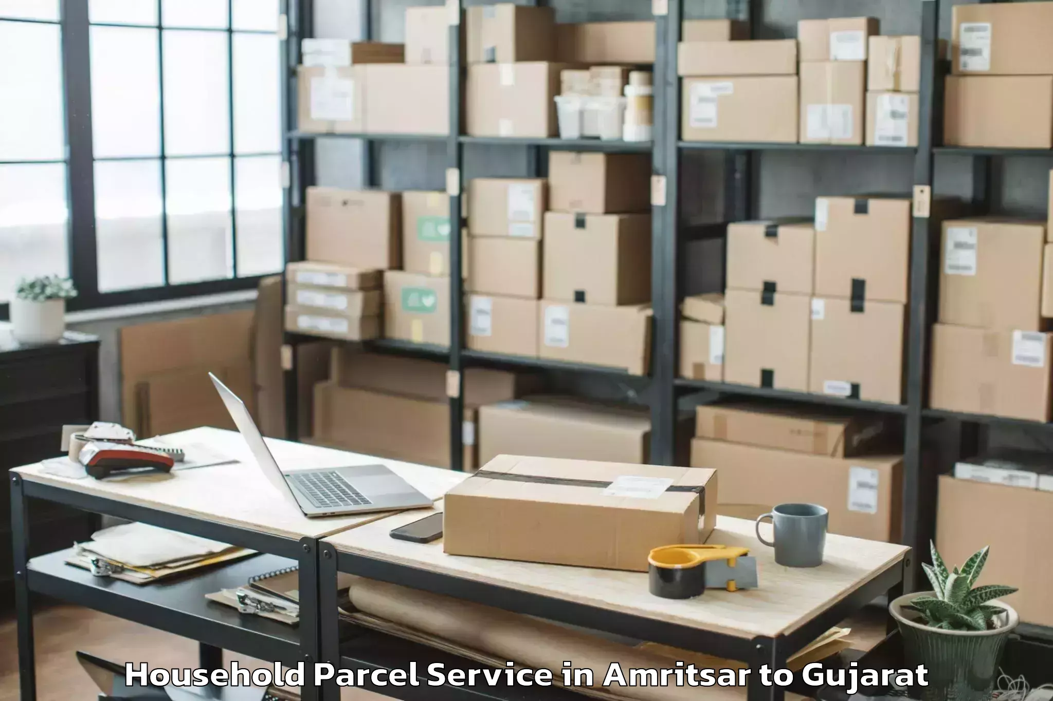 Top Amritsar to Gujarat Ayurved University Jam Household Parcel Available